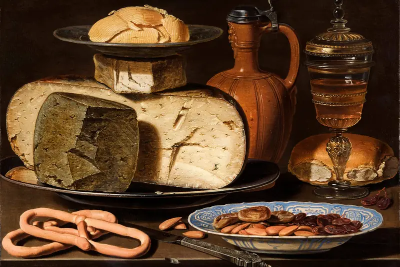 Still-life painting of cheeses, almonds and pretzels on a table